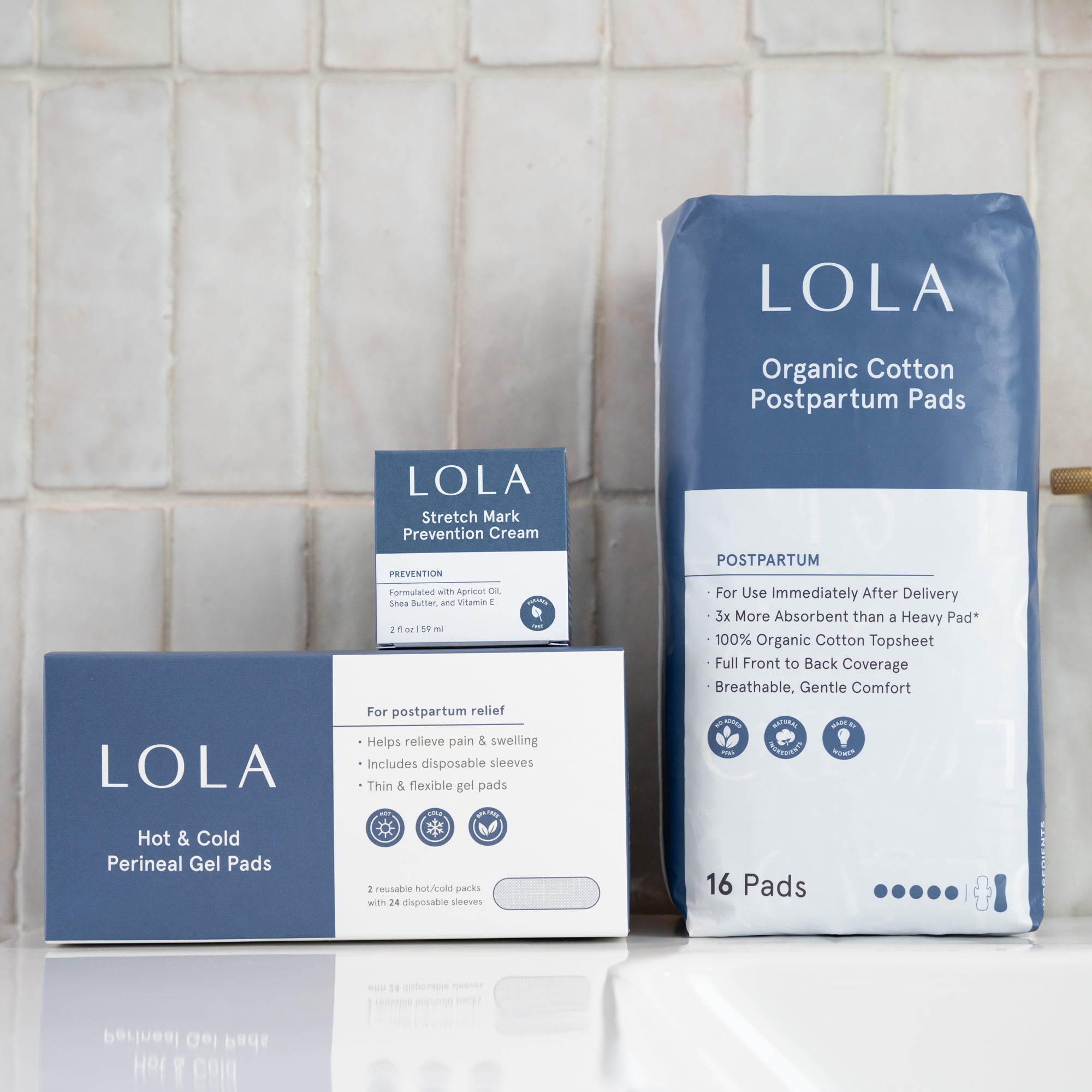 LOLA Postpartum line| Front view of LOLA Postpartum products on a counter